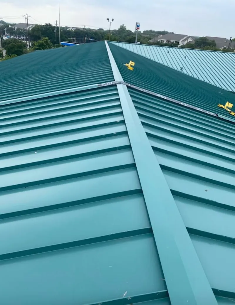 Green commercial metal roof ridge and valley for Metal Roof Repair in Biddeford