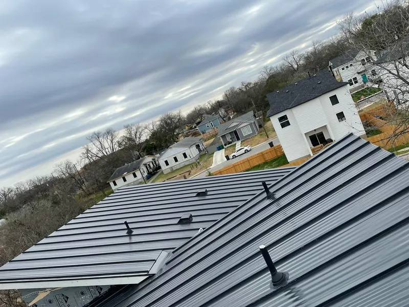 Standing seam metal roof panels with vents for Skylight Repair in Biddeford